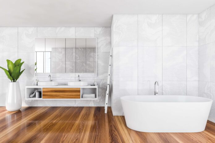 Light,Luxury,Interior,With,White,Bathtub,And,Towel,On,A